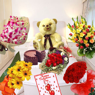 Bunch Of Fresh Orchids, Bunch Of 12 Yellow Gerberas, Bunch Of 12 Red Roses, Bunch Of 24 Red Roses, Basket Of Assorted Flowers, 1 Kg Chocolate Cake, 1.5 Feet Tall Teddy Bear And A Big Card