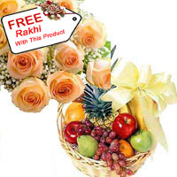 Bunch Of 12 Orange Roses, 3Kg Assorted Fresh Fruit Basket With A Free Rakhi.